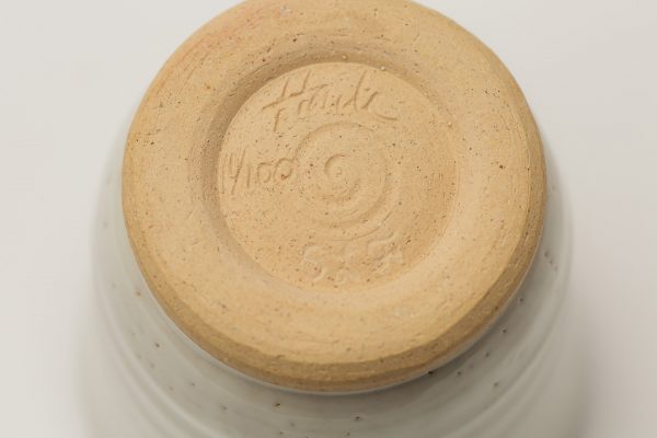 signed and numbered white tumbler